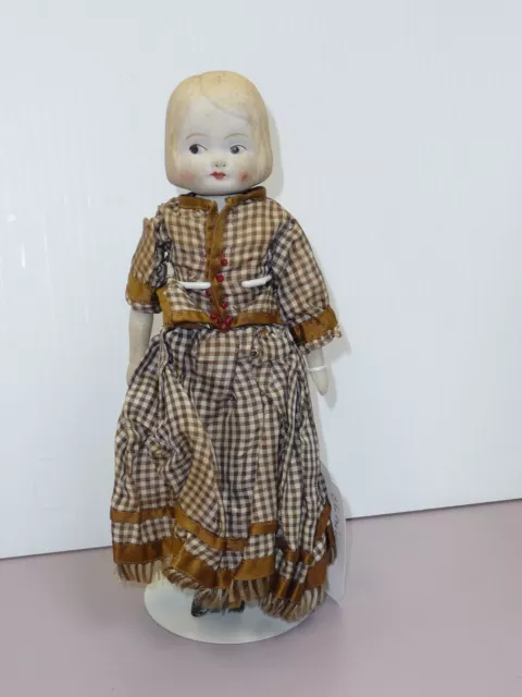 9" Antique Bisque Doll w/Cloth Body, Jointed Head, Chip on Back of Neck      #L