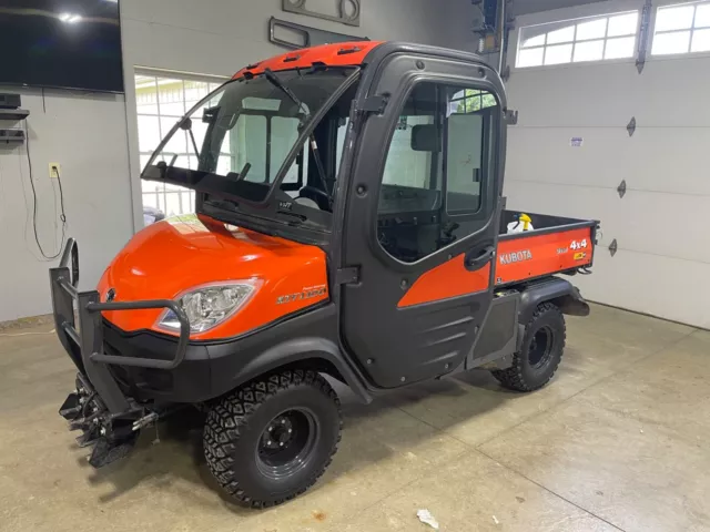 KUBOTA RTV 1100 Hydraulic dump AC/Heated cab PTO Kubota Plow only 274 hrs
