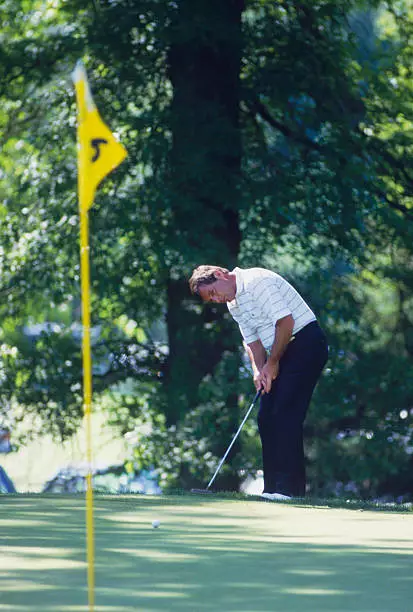 Golfer Fuzzy Zoeller Putts On The Green 1980s Golf Photo