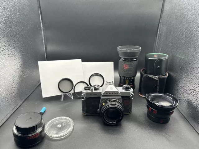 Pentax K1000 35mm SLR Camera Kit w/ 50mm or 55mm Lens Includes other lenses