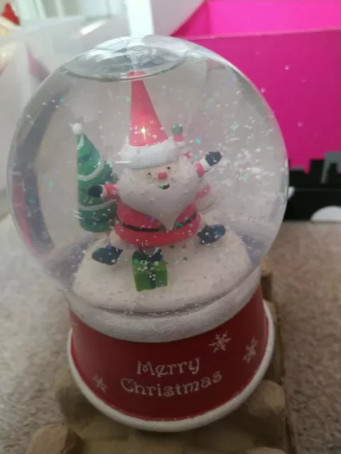 Christmas Wind Up Musical Santa Claus Snow globe from mark's and Spencer