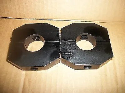 Qty of 2..... 1-1/2 inch alum round weight clamps.. NEW