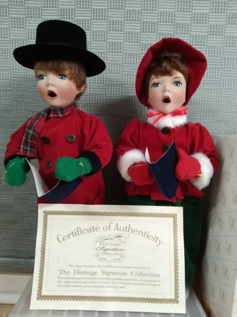 Heritage Signature Joy & Noel Boy and Girl Christmas Caroler Porcelain Dolls 12"