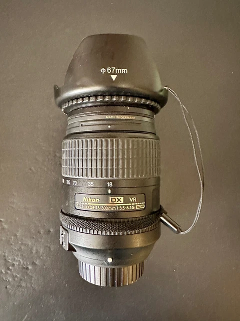 Nikon AF-S DX NIKKOR 18-300mm f/3.5-6.3G ED VR Lens with Filters and Lens Covers