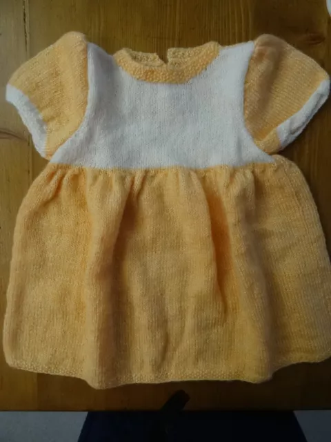 Robe bébé orange et blanche neuve T3mois tricoté mains