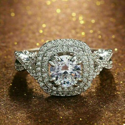 Lab-Created 2CT Round Cut Diamond Twisted Halo Engagement Ring 14K White Gold FN