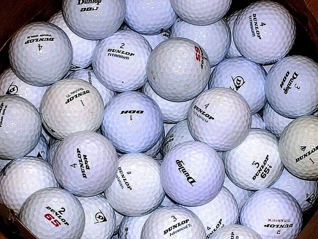 12 Dunlop Pearl And Grade A Golf Balls.....