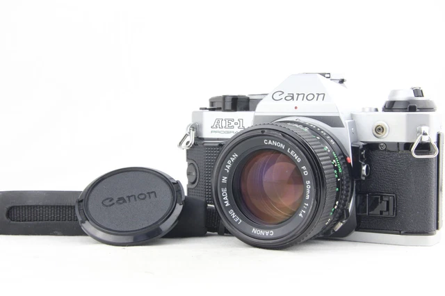 CANON AE-1 PROGRAM + FD 50mm f/1.4 SLR Plata Casi En Óptimas EUR