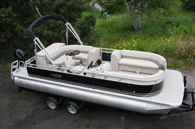 New 23 ft  pontoon boat with 60 hp and trailer