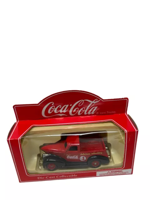 https://www.picclickimg.com/Lh4AAOSwmxNlO2t2/coca-cola-diecast-red-pickup-truck.webp