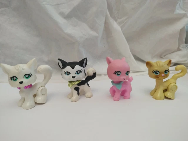 lot de 4 animaux style pet shop dont 2 aimantés par les pieds .