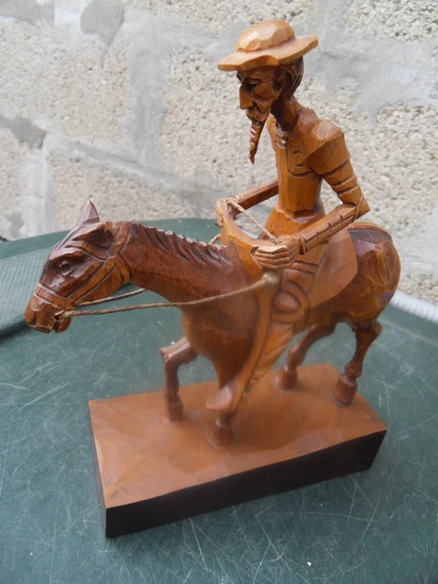 statue en bois sculpté Don quichotte de la Manche a cheval by Ouro ??