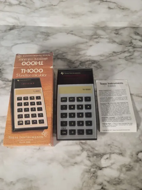 VINTAGE Texas Instruments TI-1000 Electronic Calculator TESTED Box & Manual