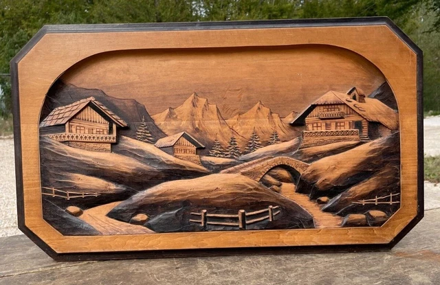 Panneau sculpté en bois de la montagne 
