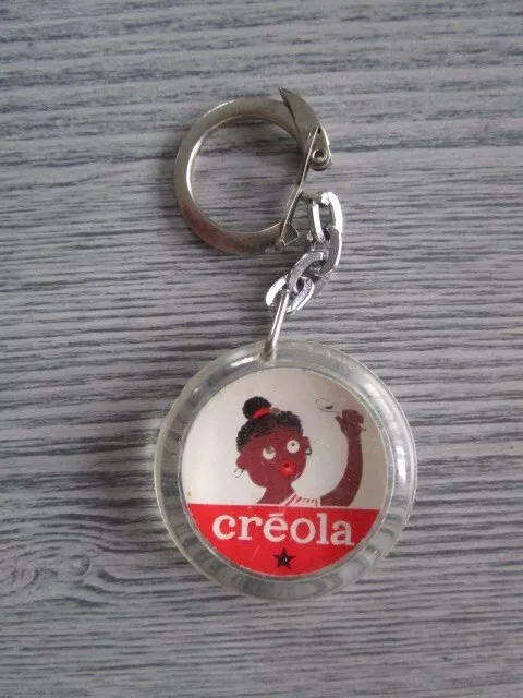 Porte-clefs publicitaire ancien " yaourt CREOLA " la roche aux fées