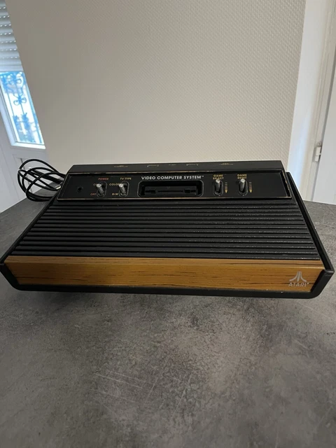 PRET A JOUER - TBE liseré orange - Console ATARI 2600 VCS woody ... - eBay