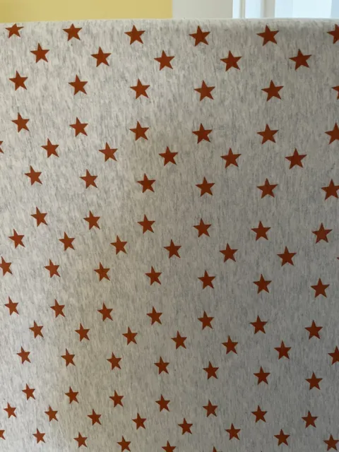 Pottery Barn baby heathered jersey star orange fitted crib sheet
