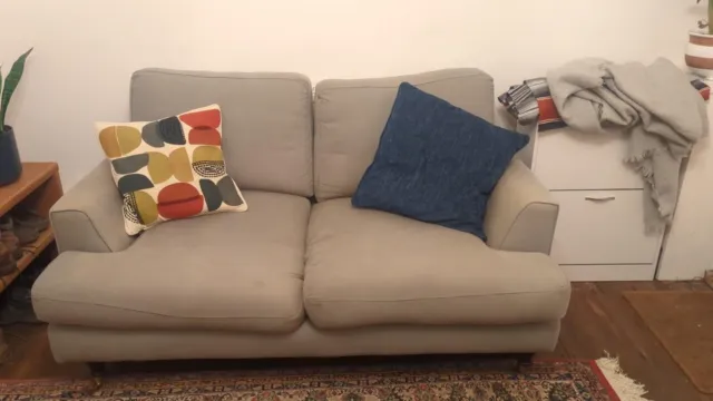 Grey sofa with mahogany feet -  2 1/2 seater - used good condition