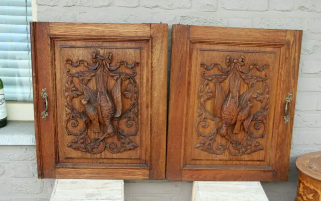 PAIR black forest wood carved hunting cabinet door panels trophy