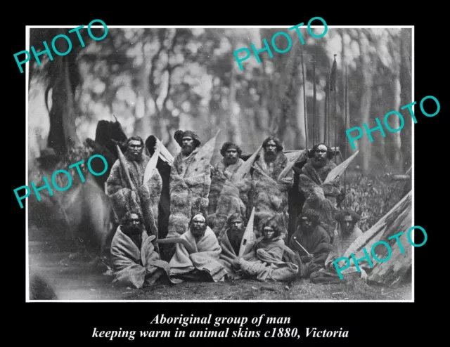 OLD POSTCARD SIZE PHOTO OF ABORIGINAL MEN KEEPING WARM IN SKINS c1880