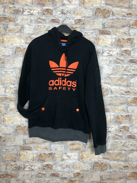 Adidas black online and orange hoodie