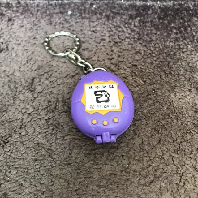 Vintage Purple 1997 McDonalds Fast Food Restaurant Tamagotchi Keychain Toy Vintage Purple 1997 McDonalds Fast Food Restaurant Tamagotchi Keychain Toy