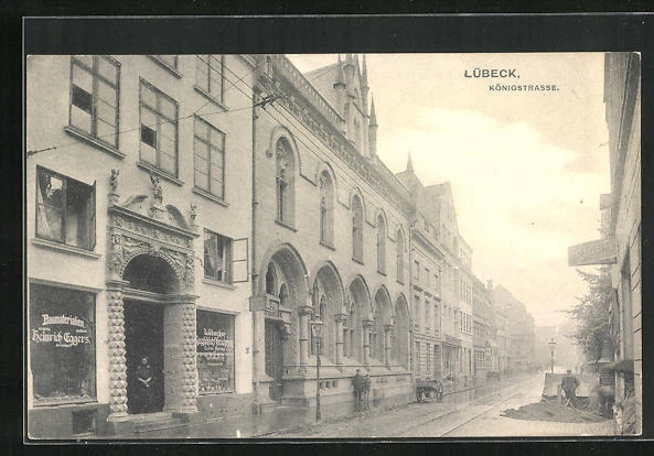 AK Lübeck, Königstrasse mit Geschäft für Baumaterialien von Heinrich Eggers