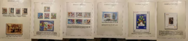 Eine kleine Sammlung mit Motiv-Briefmarken und Blöcken zum Thema Jahr des Kindes