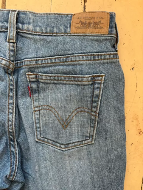Levis womens jeans size 4 short boot cut model 515