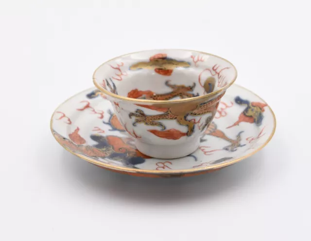 Tasse  et sous tasse en porcelaine CHINE décor de dragons