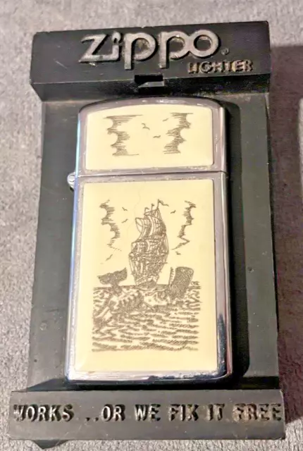 Vintage (1984) Zippo Slimline Scrimshaw "Whale Hunt" lighter--3066.23