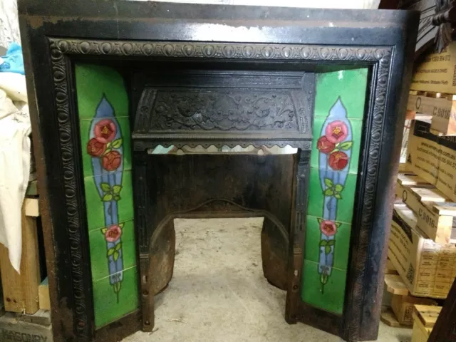 Gorgeous tiles on this cast iron fireplace in good condition