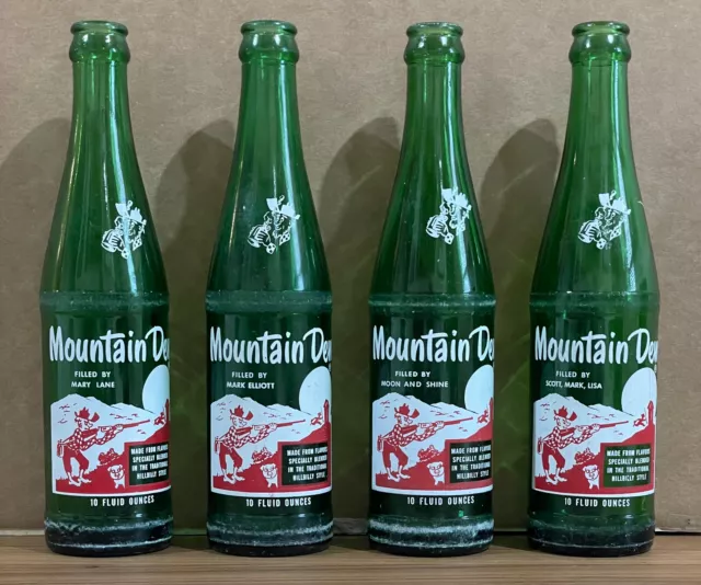 Lot of 4 Vintage Mountain Dew Bottles w/ Unique Names Under the Word “Mountain”