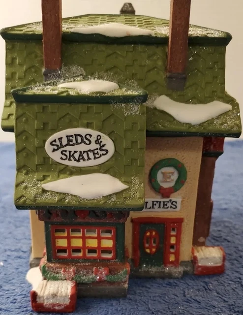 Dept 56 North Pole Series Elfie’s Sleds and Skates 5625-1