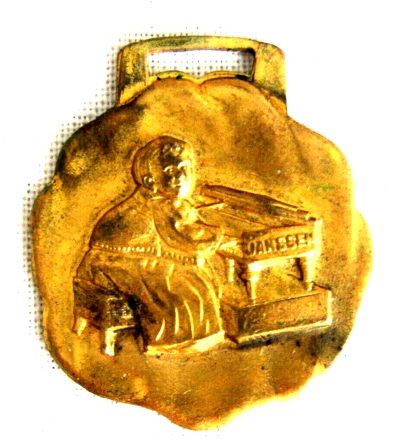 1908 Ben H. Janssen Pianos Souvenir Watch Fob Glided Child Playing Piano
