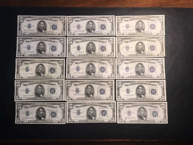 15 1934 Series 5.00 silver certificates high grade Vf to XF some better.