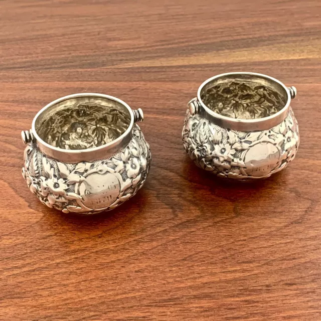 (2) DOMINICK & HAFF REPOUSSE STERLING SILVER HANDLED MASTER SALT CELLARS c.1879