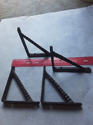 small shelf brackets set of four, three and a half inch. Brown cast iron
