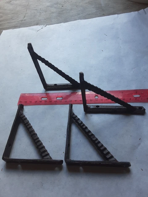 small shelf brackets set of four, three and a half inch. Brown cast iron