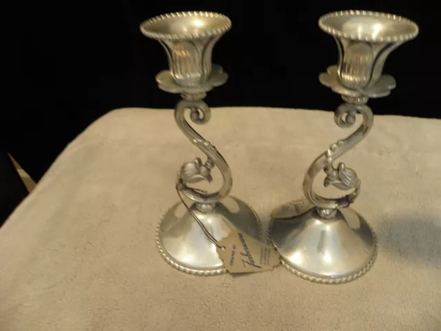 Pair of vintage hammered aluminum candle holders marked Farberware