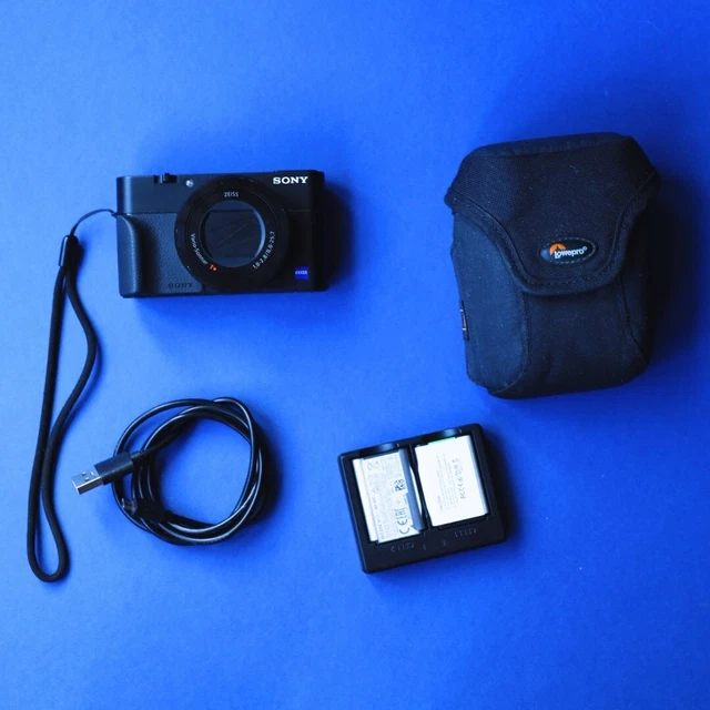 Sony Cyber-shot RX100 V M5 Digital Camera - Black w/ 24-70mm lens and grip
