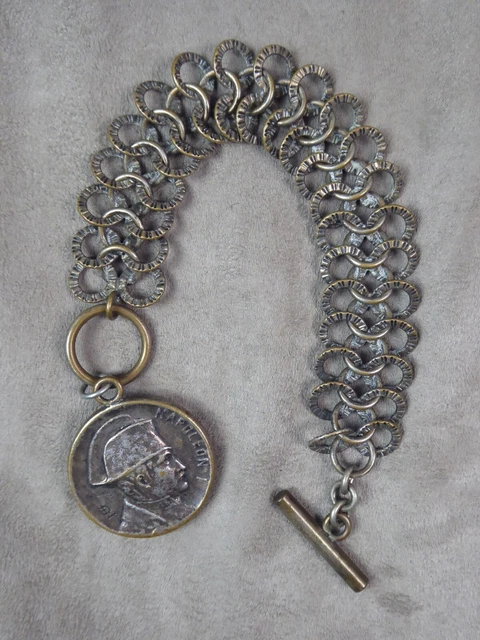 CHAINE DE MONTRE ancienne, à décor de MEDAILLE NAPOLEON 1er?