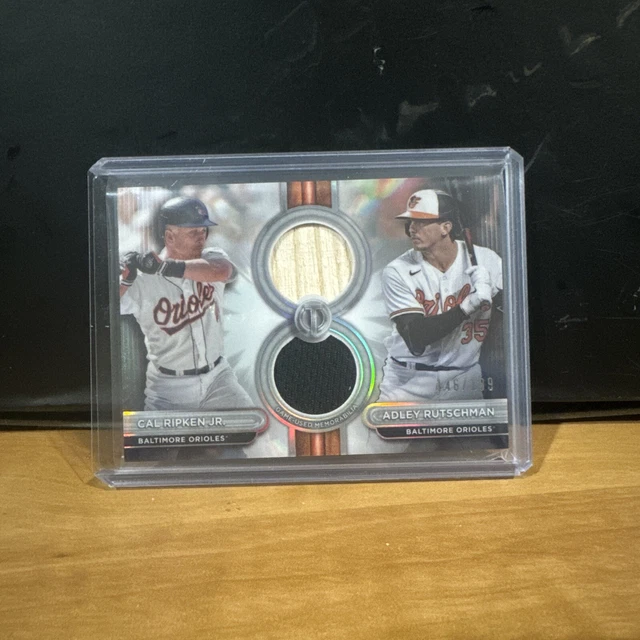 CAL RIPKEN JR Adley Rutschman 2024 Topps Tribute Dual Jersey Bat Relic