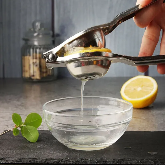 Outil de presse manuelle à la main pour une extraction facile du jus de citrons