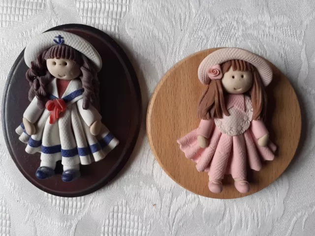 Heirlooms Of Tomorrow, x2 little girls hand made from China clay.