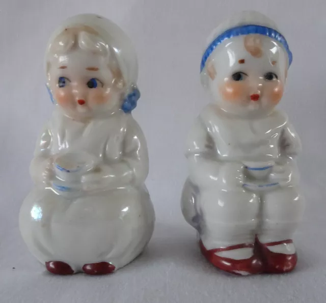 Vintage Dutch Boy and Girl Pepper and Salt Shakers