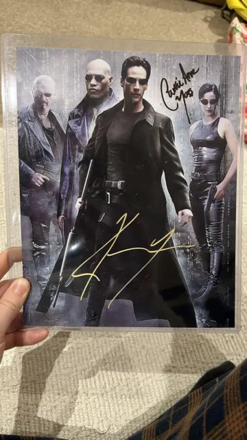 Signed And Certified Photo The Matrix Keanu Reeves And Carrie Anne Moss.