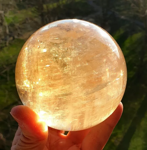 Sphère en Calcite naturelle transparente de 94 mm et 1305 gr (+ arcs-en ciel)