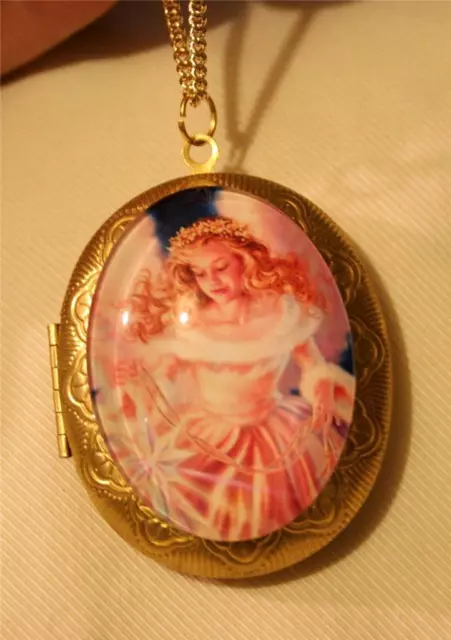 Gorgeous Winter Angel with Stars and Garland Locket Goldtone Pendant Necklace