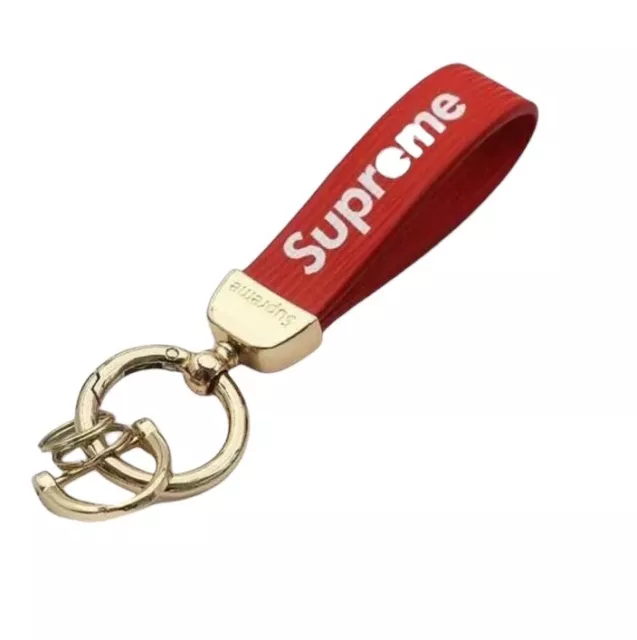 RED-GOLD  SUPREME PENDANT WITH KEY HOLDER, AND FLAT SCREWDRIVER. Keychain
